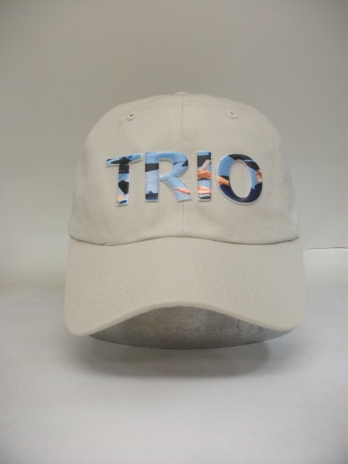 First the logo or shape is done as 3D puff embroidery.  Then we print any full color image on top of 3D embroidery.